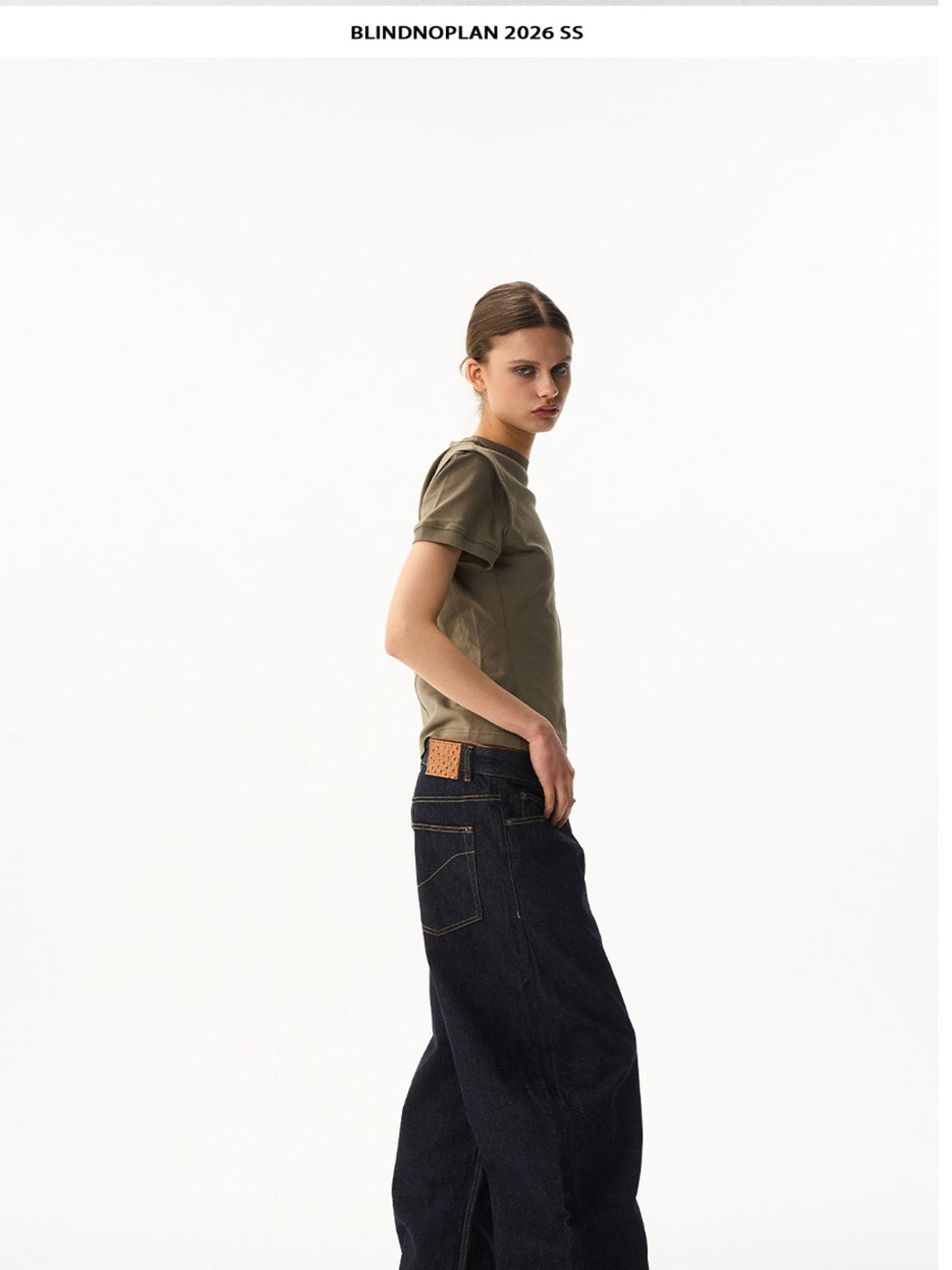 BLINDNOPLAN Curved Wide Leg Raw Denim Jeans in Denim - On Female Model