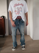 UNKNOWNWORLD Ice Blue Washed Micro Flare Jeans in Blue - On Male Model
