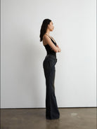 FaxCopyExpress Distressed Slim Flare Jeans in Black - On Female Model