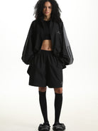 MASONPRINCE Striped Cotton Blend Track Shorts in Black - On Female Model