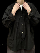 USAGE Oversized Micro Check Button Down Shirt in Black - On Male Model