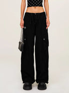 SMFK Wide Leg Parachute Cargo Pants in Black - On Female Model