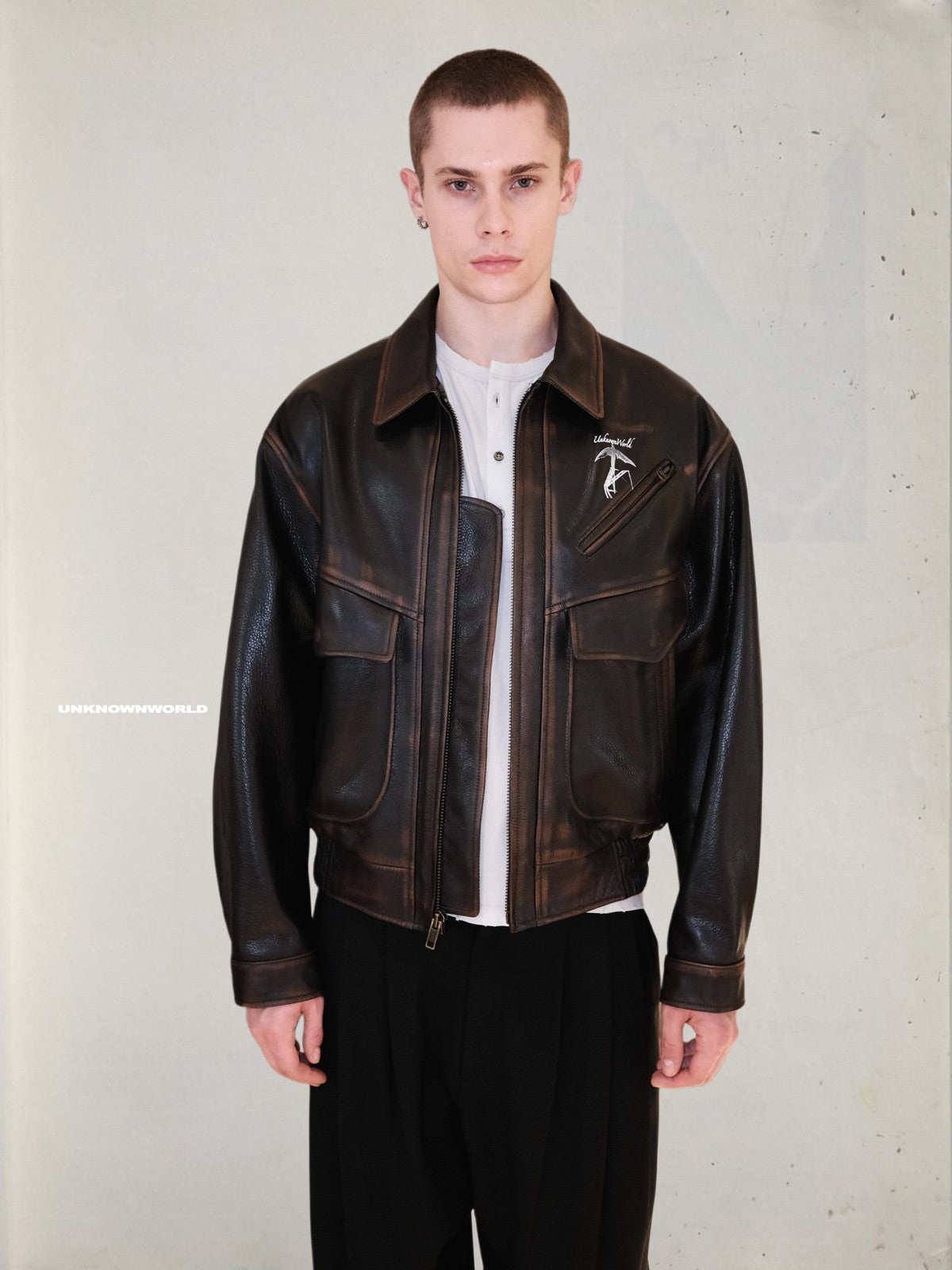 UNKNOWNWORLD Distressed Cowhide Flight Jacket in Brown - On Male Model