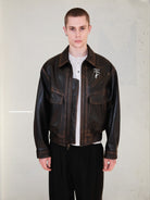 UNKNOWNWORLD Distressed Cowhide Flight Jacket in Brown - On Male Model