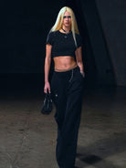 SMFK Wide Leg Cotton Cargo Sweatpants in Black - On Female Model