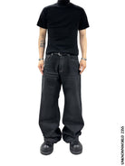 UNKNOWNWORLD Washed Waxed Wide Leg Jeans in Black - On Model