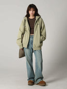 MASONPRINCE High Waisted Distressed Flared Jeans in Denim - On Female Model