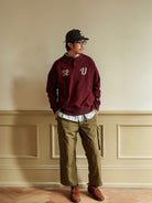 USAGE Terry Cotton Henley Sweatshirt in Burgundy - On Male Model