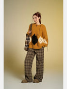 BeerBro Distressed Fuzzy Argyle Sweater in Mustard - On Female Model