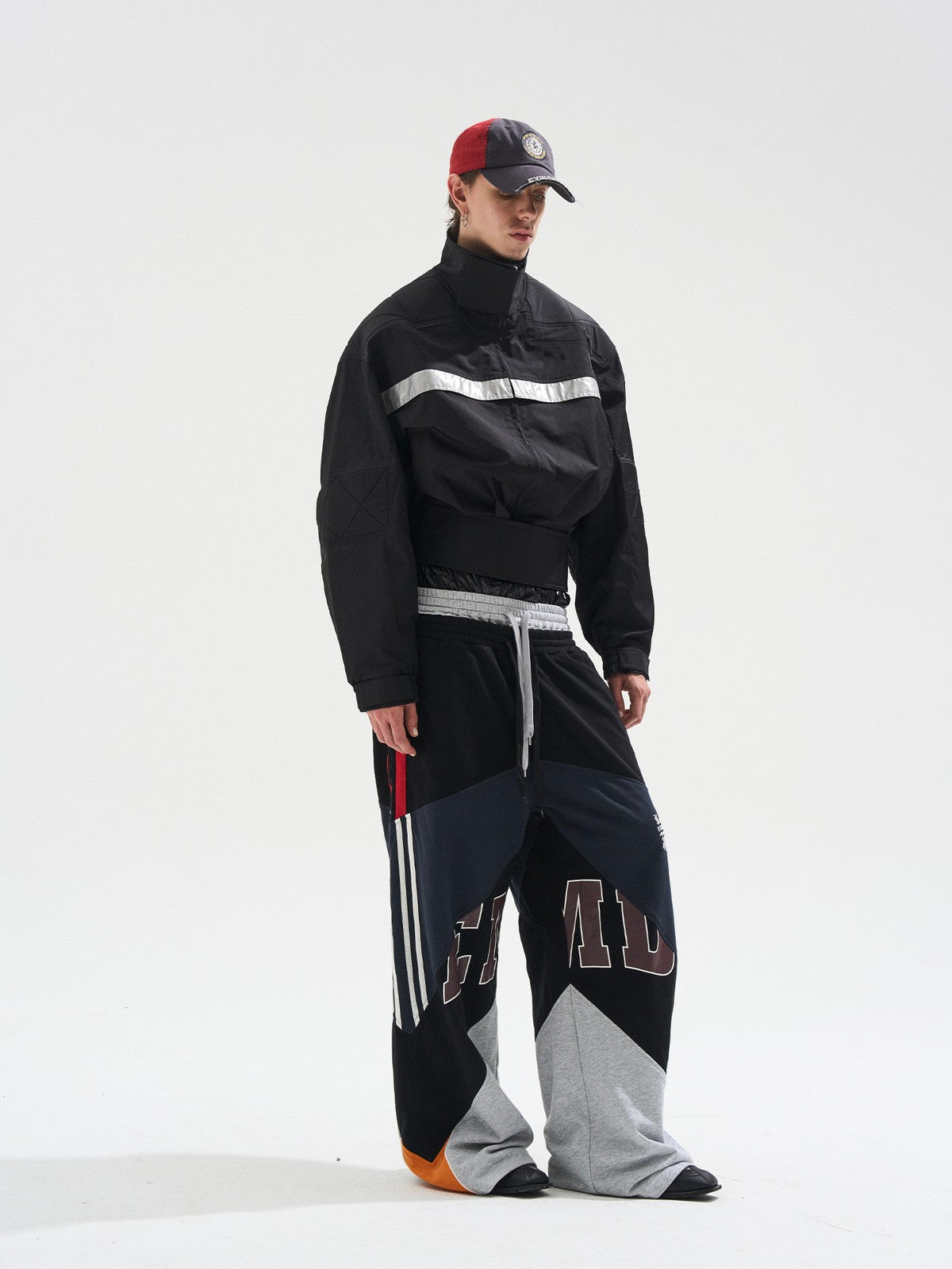 BLINDNOPLAN Reflective Strip Stand Collar Jacket in Black - On Male Model