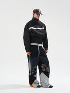 BLINDNOPLAN Reflective Strip Stand Collar Jacket in Black - On Male Model