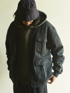 USAGE Cotton Safari Pocket Cardigan Sweatshirt in Navy Blue - On Male Model
