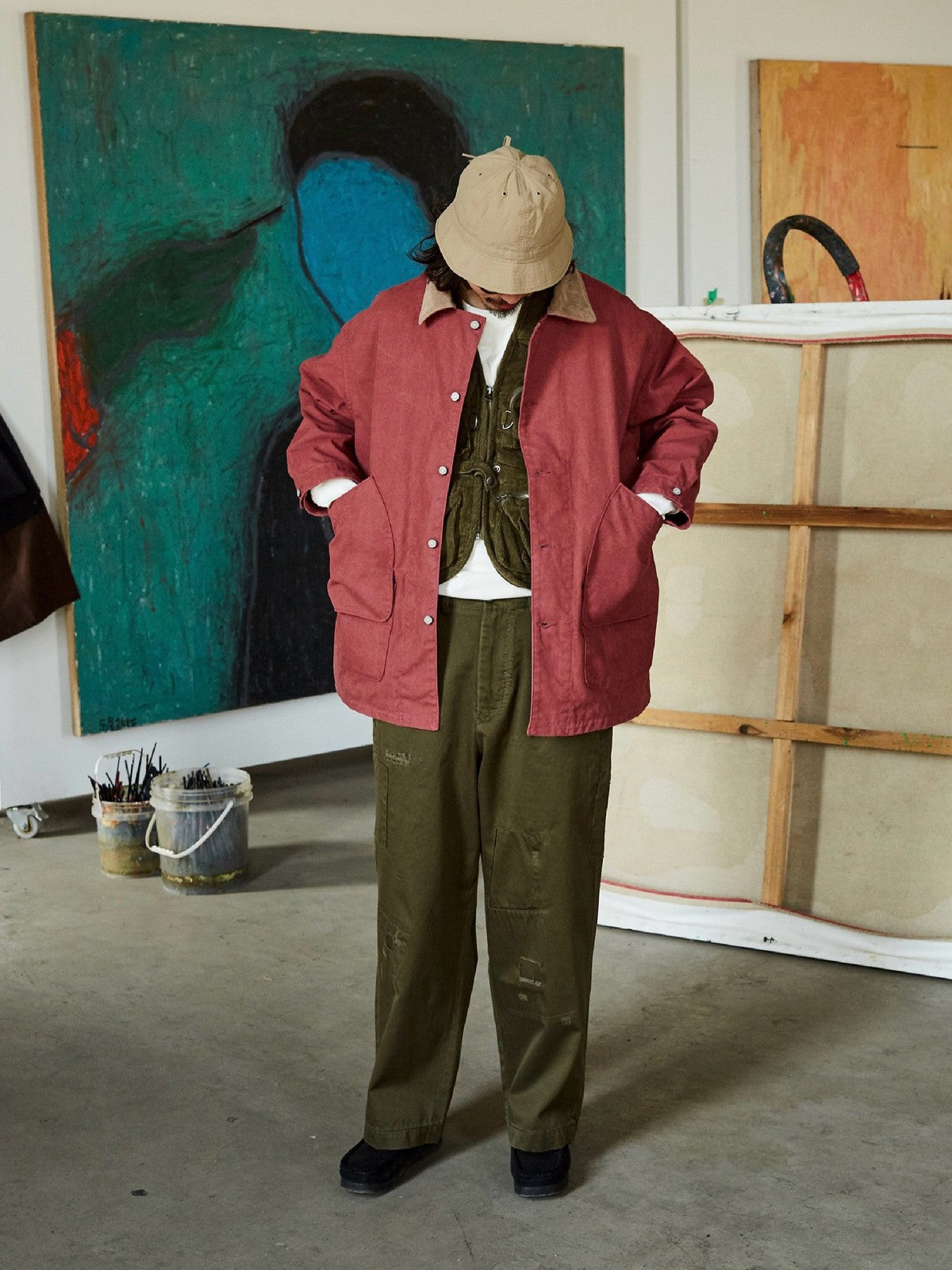 USAGE Hand Distressed Patched Chinos in Olive - On Male Model