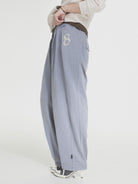 MASONPRINCE Wide Leg Inverted Pleat Sweatpants in Purple - On Model