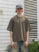 SOD Deconstructed Panel Cotton T Shirt in Olive - On Male Model