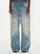 BLINDNOPLAN Paneled Embroidered Distressed Denim Pants in Blue - On Male Model