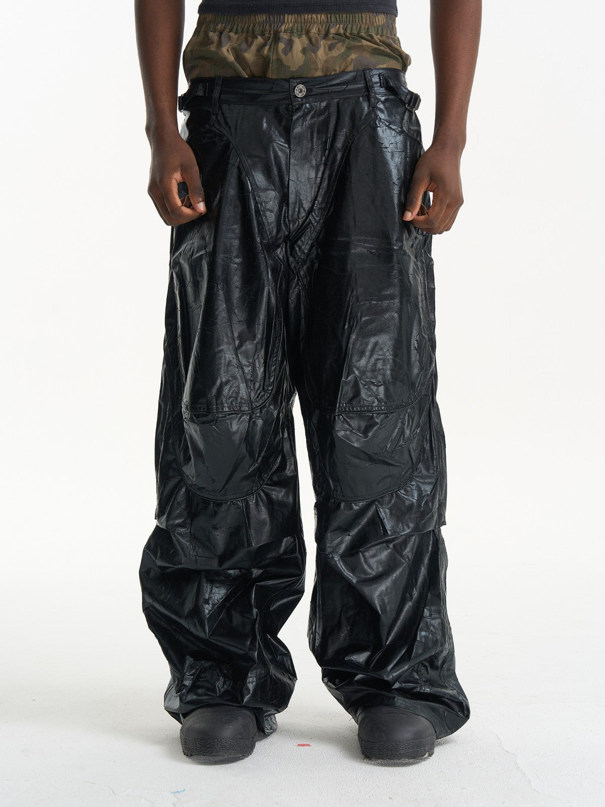 BLINDNOPLAN Faux Leather Layered Cargo Pants in Black - On Male Model