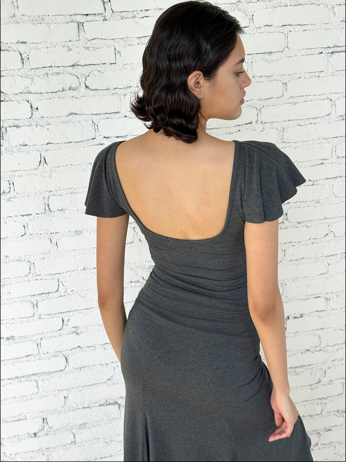 FaxCopyExpress Flutter Sleeve Open Back Top in Gray - On Female Model