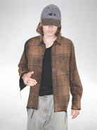 UNKNOWNWORLD Distressed Raw Hem Plaid Shirt in Brown - On Male Model
