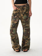 BLINDNOPLAN Paneled Camo Flared Cargo Pants in Green - On Model