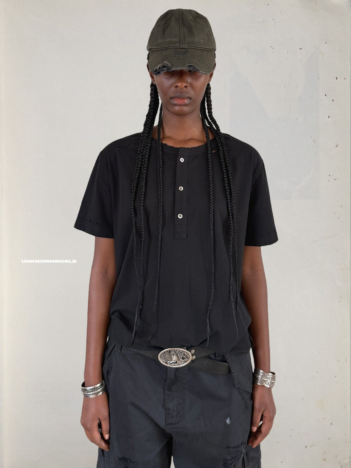 UNKNOWNWORLD Distressed Cotton Henley T Shirt in Black - On Model