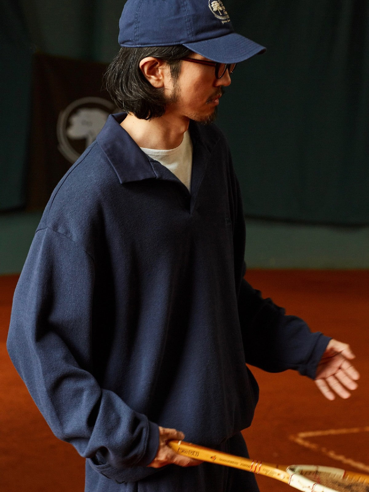 USAGE Oversized Textured Long Sleeve Polo in Navy Blue - On Male Model