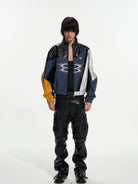 BLINDNOPLAN Color Blocked Faux Leather Biker Jacket in Black - On Male Model