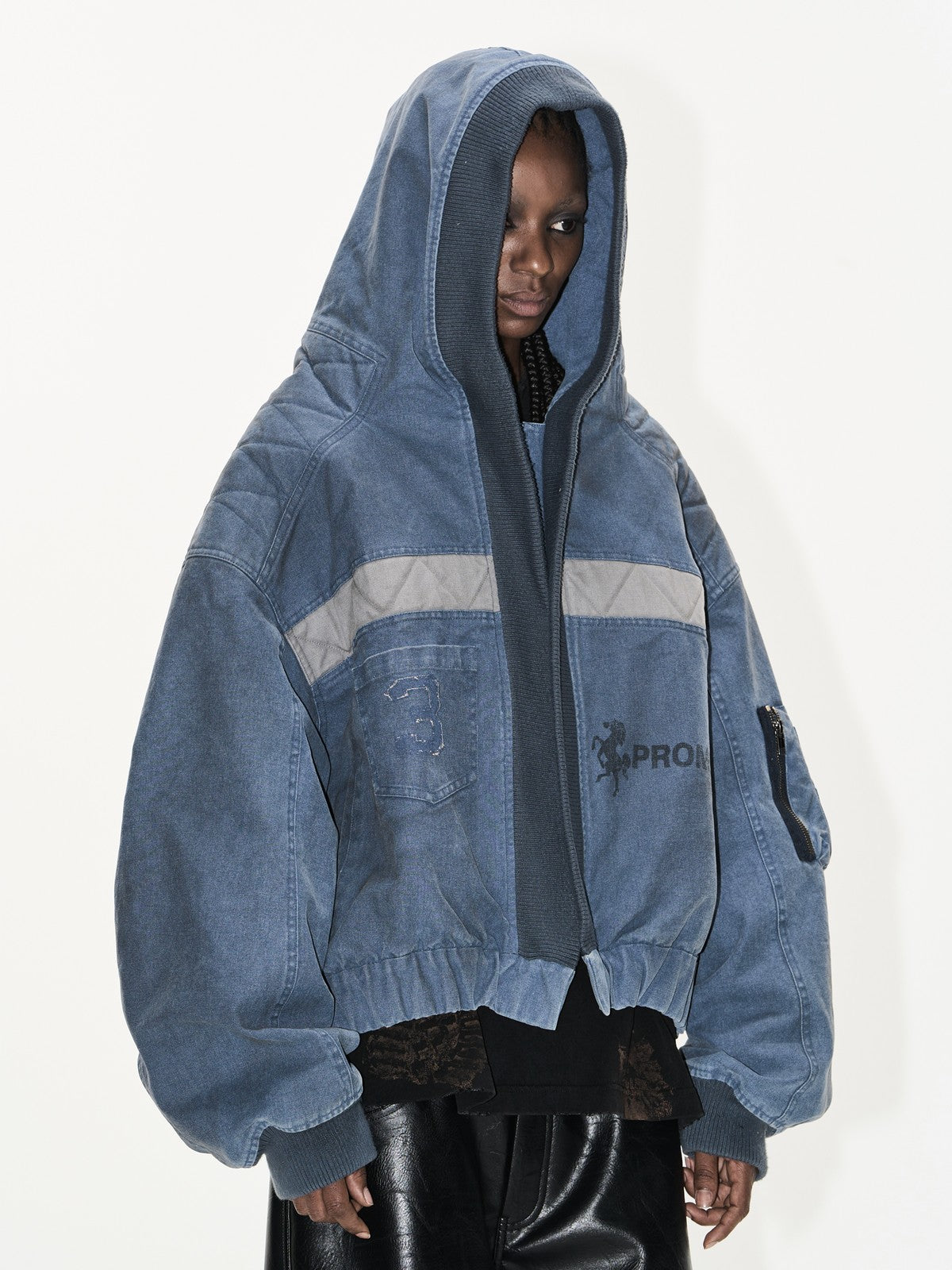 BLINDNOPLAN Distressed Hooded MA 1 Bomber Jacket in Blue - On Female Model