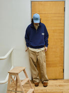USAGE Heavyweight Cotton Half Zip Sweatshirt in Navy Blue - On Male Model