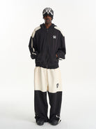 BLINDNOPLAN Color Block Wide Leg Sweatpants in Black - On Male Model