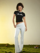 BEERBRO Lace Trim Embroidered Modal Baby Tee in Black - On Female Model