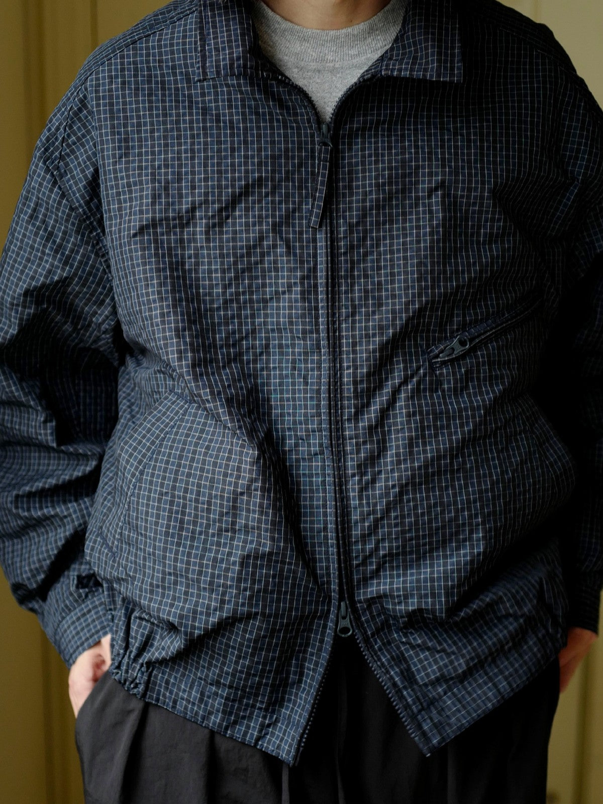 USAGE Jacquard Check Harrington Jacket in Navy Blue - On Male Model