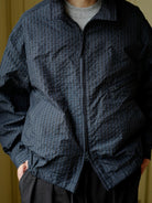 USAGE Jacquard Check Harrington Jacket in Navy Blue - On Male Model