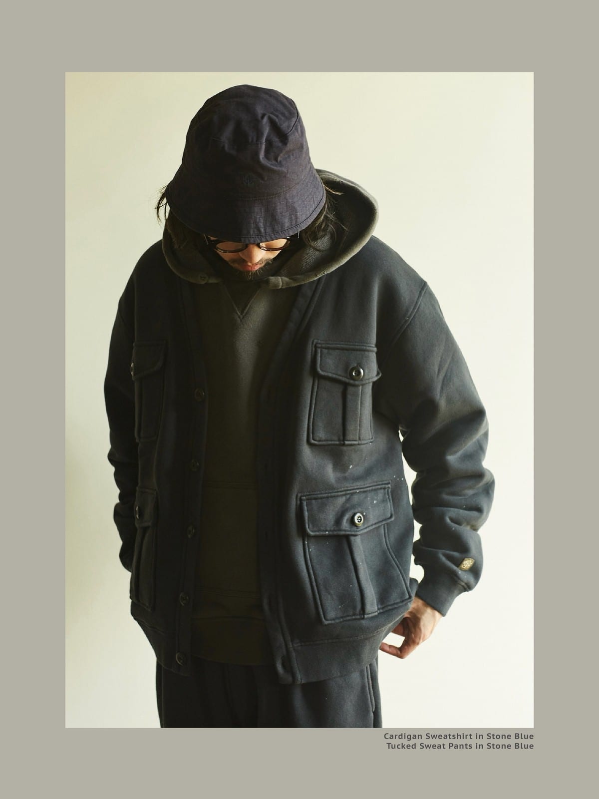 USAGE Cotton Safari Pocket Cardigan Sweatshirt in Navy Blue - On Male Model
