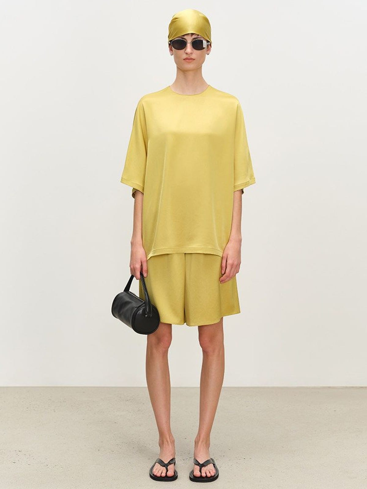 MSBEAST Oversized Acetate Satin T Shirt in Yellow - On Female Model
