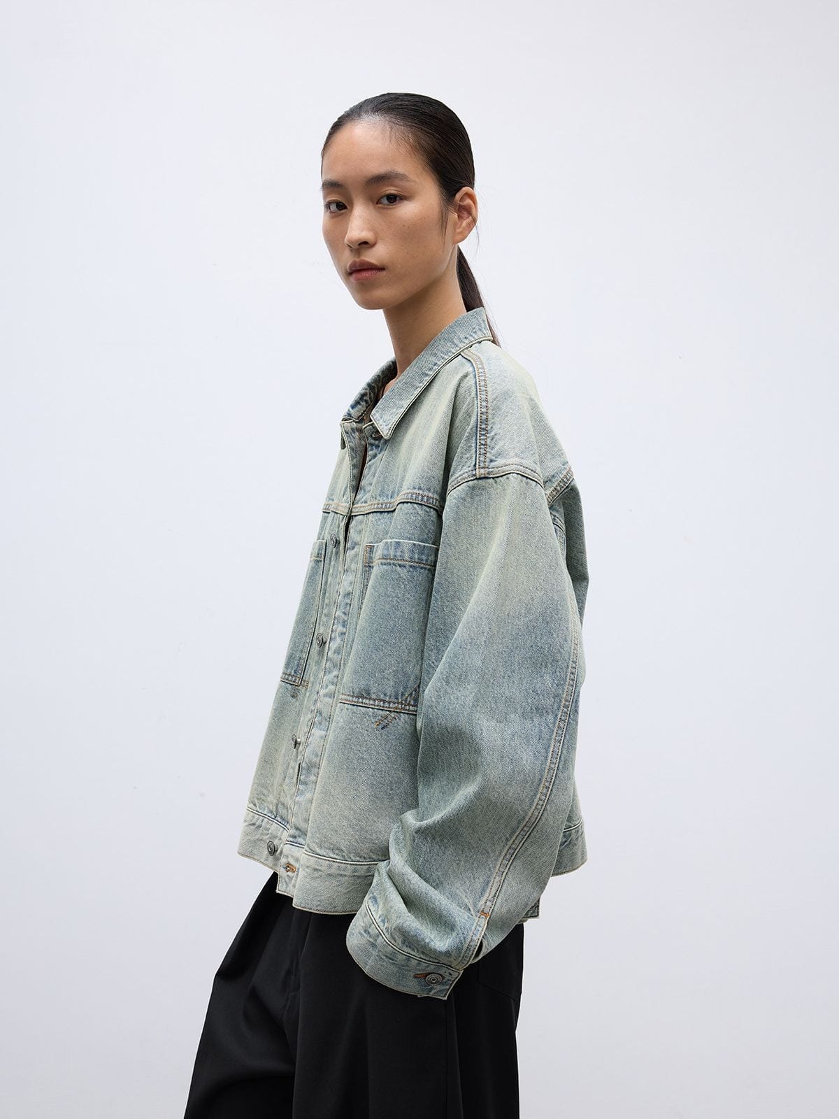 Random Piece Washed Cotton Cropped Denim Jacket in Sky Blue - On Female Model