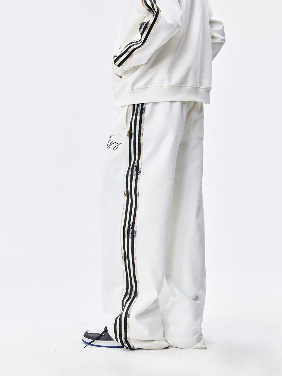 MEDM Lace Paneled Striped Track Pants in White - On Model