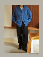 USAGE Heavily Washed Selvedge Denim Jeans in Black - On Male Model