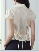 RARELY ALIKE Peter Pan Collar Tie Front Shirt in Cream - On Female Model