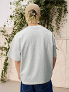 MEDM Tufted Logo Cotton T Shirt in Gray - On Model