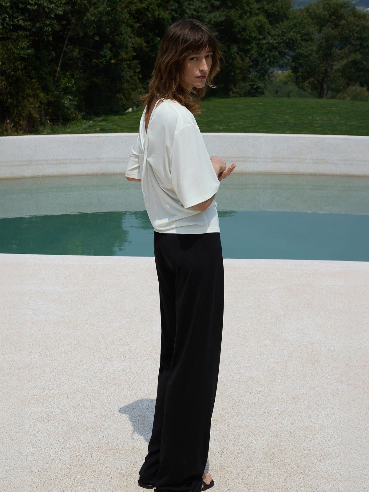 TEASEL Cooling Wide Leg Trousers in Black - On Female Model