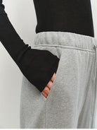 MSBEAST Cotton Terry Sweatshirt Tapered Joggers in Gray - On Female Model