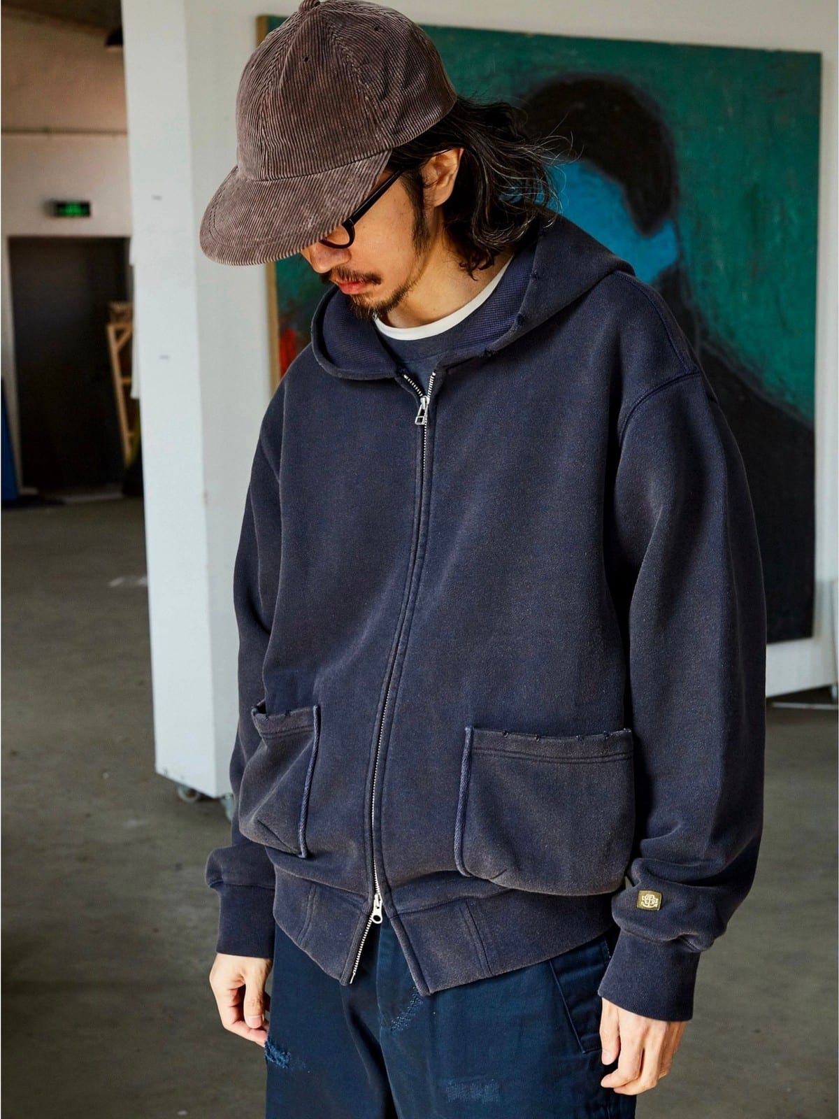USAGE Hand Distressed Washed Zip Hoodie in Navy Blue - On Male Model