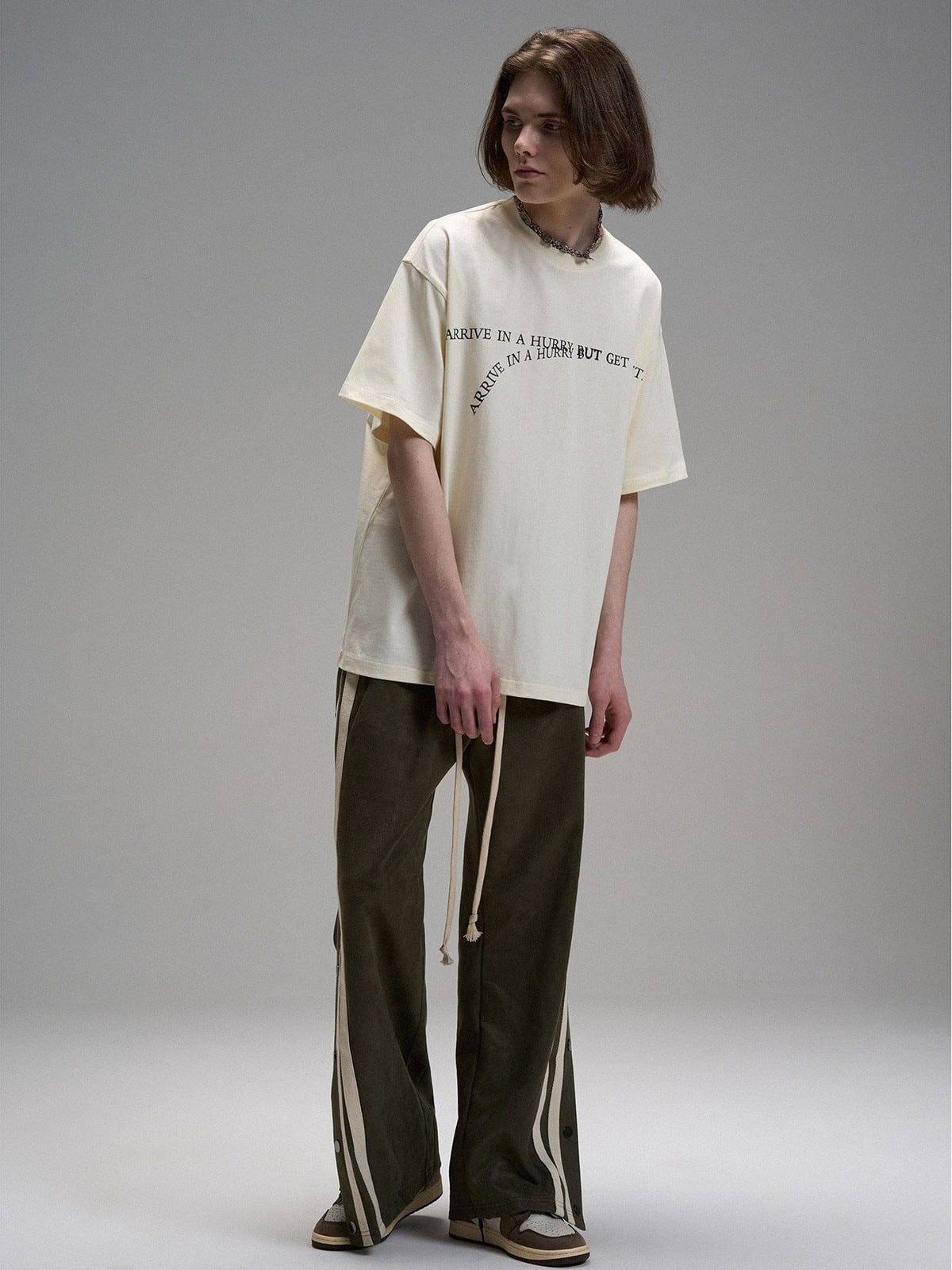 LOSTCTRL Heavyweight Letter Print T Shirt in Cream - On Male Model
