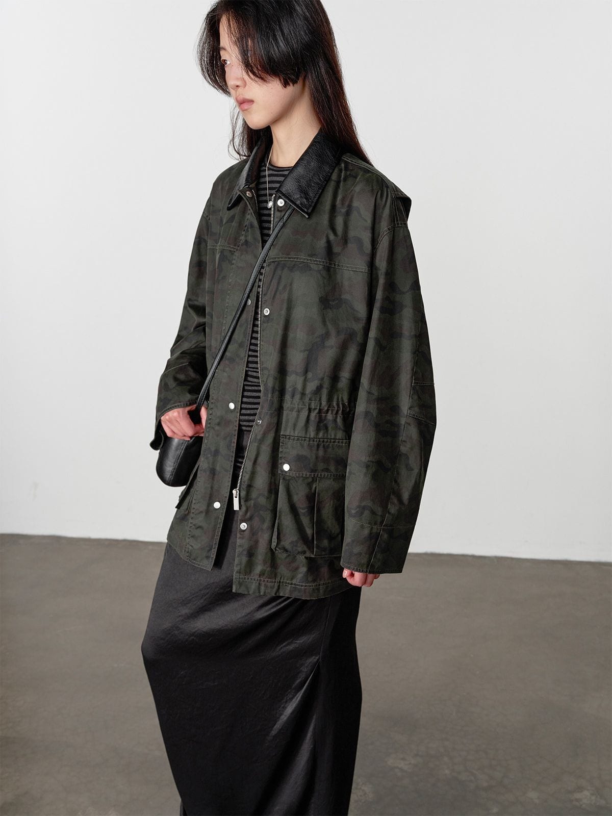 Random Piece Matte Coated Utility Jacket in Army Green - On Female Model