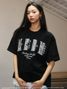 MEDM Pearl Embellished Letter Cotton T Shirt in Black - On Female Model