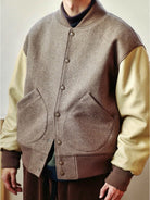 USAGE Reversible Velvet Leather Varsity Jacket in Beige - On Male Model