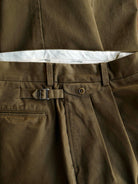 USAGE Pleated Cotton Twill Chinos in Olive - Detail