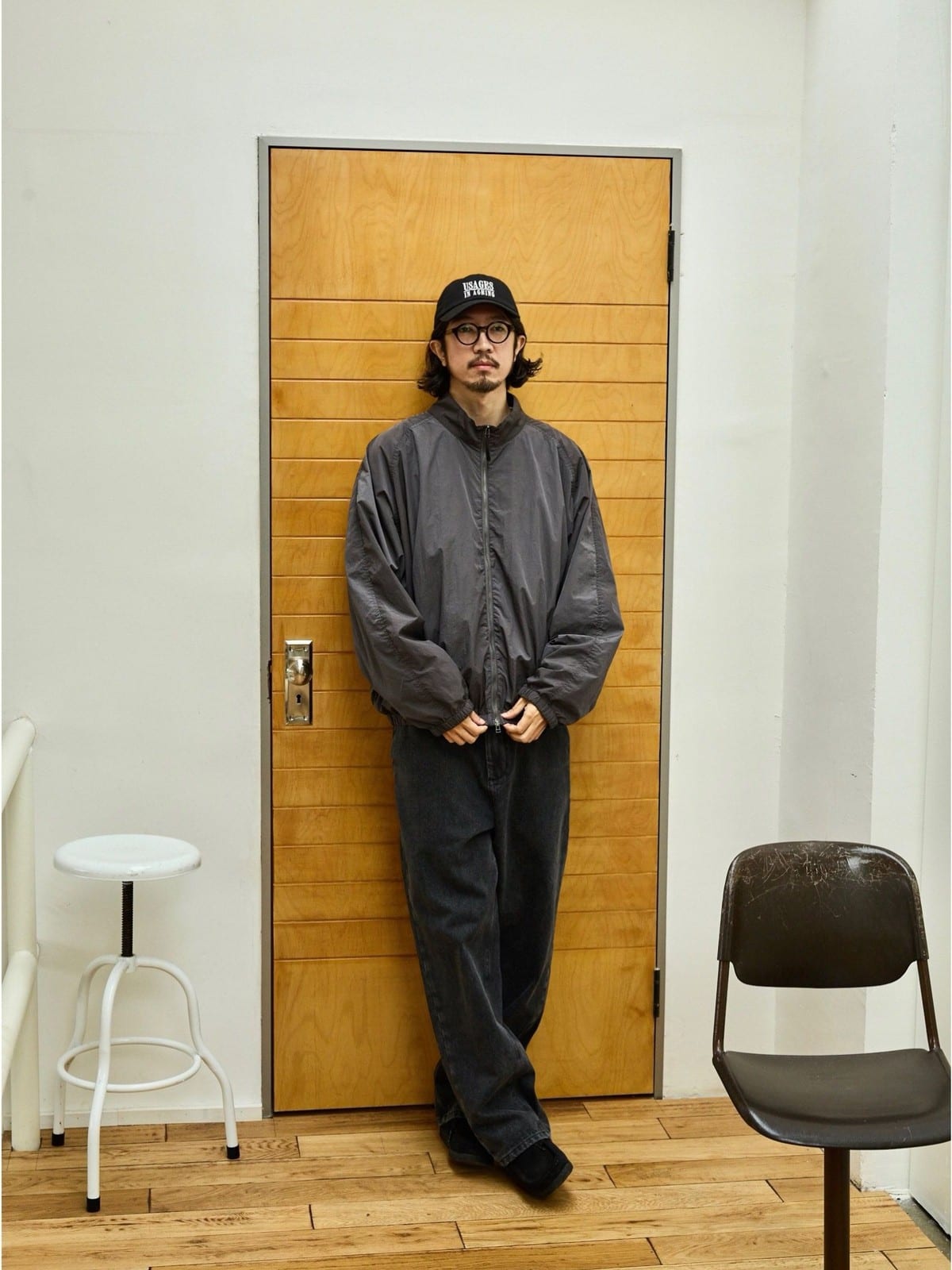 USAGE Lightweight Nylon Zip Up Jacket in Gray - On Male Model