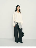 TEASEL Worsted Wool Henley Sweatshirt in Cream - On Female Model